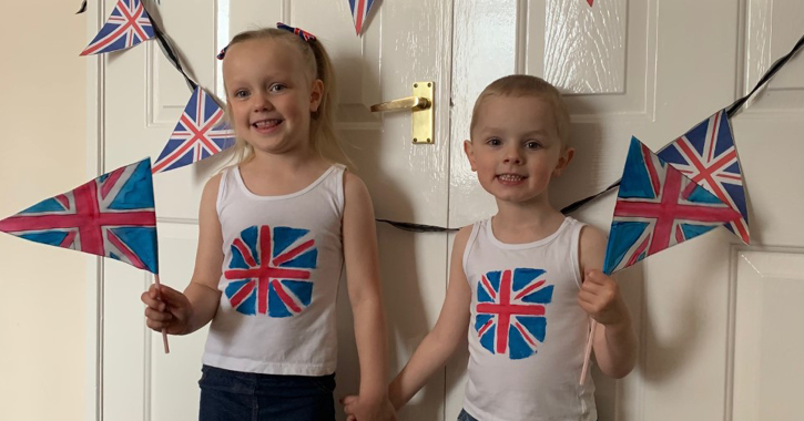 St Cuthbert’s Roman Catholic Primary School and Nursery pupils Mae and Charlie McLean celebrate VE Day at home